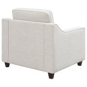 Sillón tapizado con brazos inclinados Christine en beige