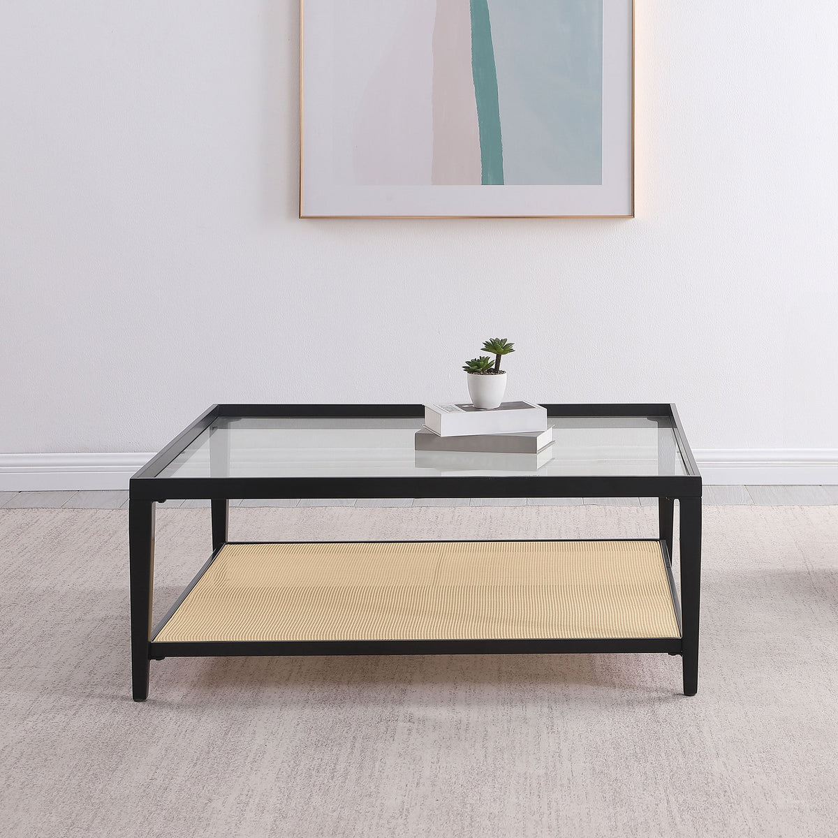 Mesa de centro Amherst de metal con tapa de vidrio y estante de caña, color negro