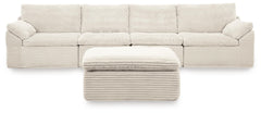 Canefield 4-Piece Sectional with Ottoman