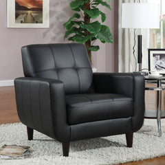 Sillón tapizado Aaron con brazos articulados y capitoné, color negro