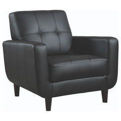 Sillón tapizado Aaron con brazos articulados y capitoné, color negro