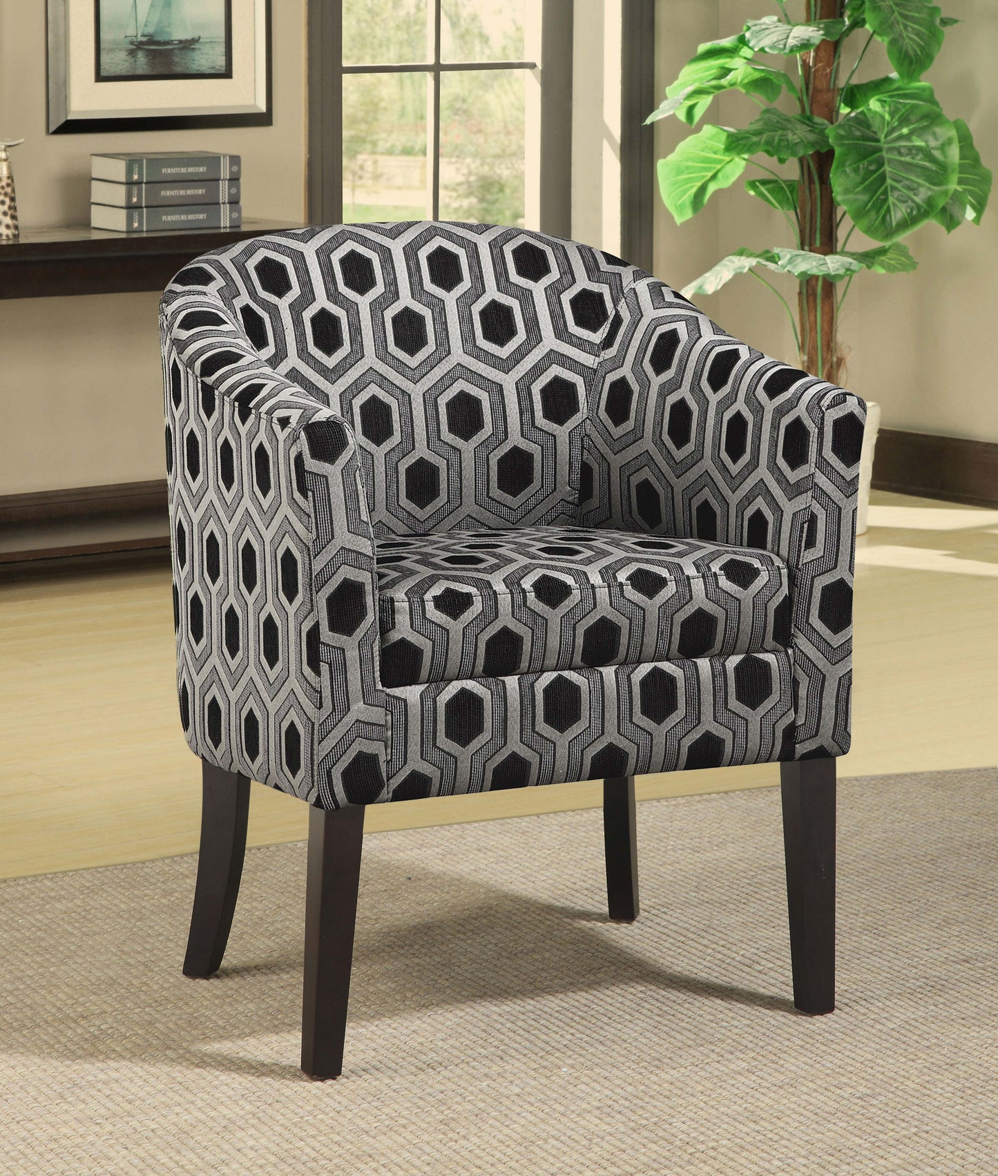 Sillón club tapizado Jansen con acento en gris y negro