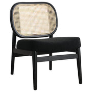 Sillón Rayo con respaldo de caña de ratán y asiento acolchado, color negro