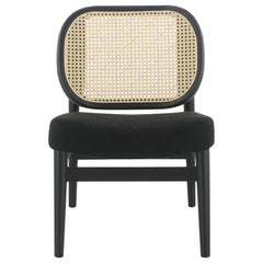 Sillón Rayo con respaldo de caña de ratán y asiento acolchado, color negro