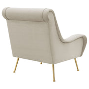 Sillón tapizado Ricci con brazos en forma de silla de montar en color piedra