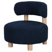 Silla decorativa Zonie Boucle con respaldo de barril tapizado en naranja