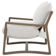 Sillón Ginebra Boucle tapizado con brazos de madera, color arena