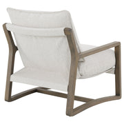 Sillón Ginebra Boucle tapizado con brazos de madera, color arena
