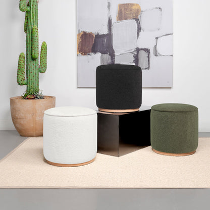 Otomana redonda tapizada en piel de oveja sintética Zena, color negro