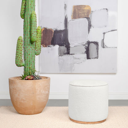 Otomana redonda tapizada en piel de oveja sintética Zena, color negro