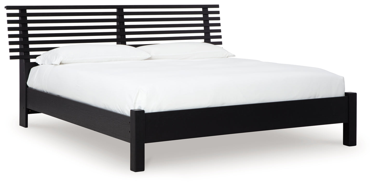 Danziar Queen Slat Panel Bed, Dresser, Mirror and Chest