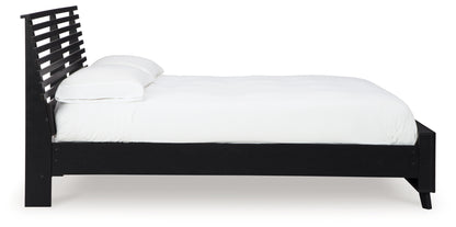 Danziar Queen Slat Panel Bed, Dresser, Mirror and Chest