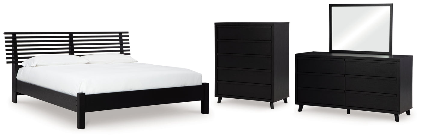 Danziar Queen Slat Panel Bed, Dresser, Mirror and Chest