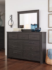 Brinxton Queen/Full Panel Headboard Bed with Mirrored Dresser and Chest