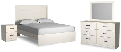 Stelsie Queen Panel Bed with Mirrored Dresser and Nightstand