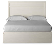 Stelsie Queen Panel Bed with Mirrored Dresser and Nightstand