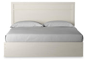 Stelsie King Panel Bed with Mirrored Dresser and Nightstand
