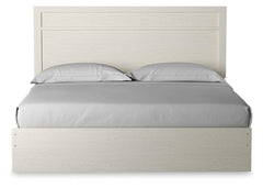 Stelsie King Panel Bed with Mirrored Dresser and Nightstand