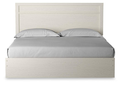 Stelsie King Panel Bed with Mirrored Dresser and Nightstand