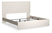 Stelsie King Panel Bed with Mirrored Dresser and Nightstand