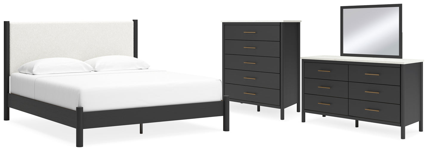 Cadmori King Upholstered Panel Bed, Dresser, Mirror and Chest