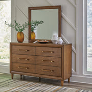 Lyncott California King Upholstered Bed with Mirrored Dresser