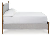 Lyncott King Upholstered Bed with Mirrored Dresser and Nightstand