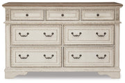 Realyn Queen Upholstery Panel Bed, Dresser, Chest, Nightstand, and Vanity Set