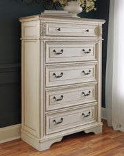 Realyn King Upholstered Panel Bed with Mirrored Dresser and Chest