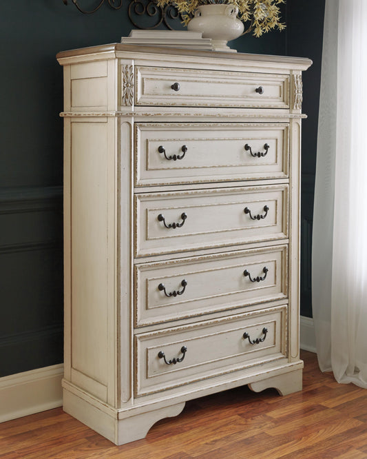 Realyn King Upholstered Panel Bed with Mirrored Dresser and Chest