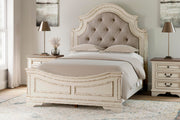 Realyn Queen Upholstered Panel Bed with Mirrored Dresser