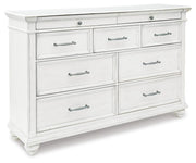 Kanwyn Queen Upholstered Panel Bed, Dresser, and Nightstand