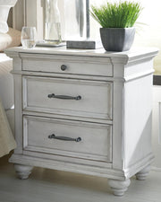 Kanwyn Queen Upholstered Panel Bed, Dresser, and Nightstand