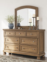 Feddinger Queen Storage Sleigh Bed with Mirrored Dresser