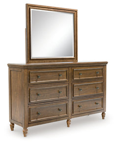 Sturlayne California King Upholstered Panel Bed, Dresser, Mirror, Chest and Nightstand