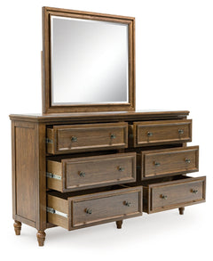 Sturlayne California King Upholstered Panel Bed, Dresser, Mirror and Chest