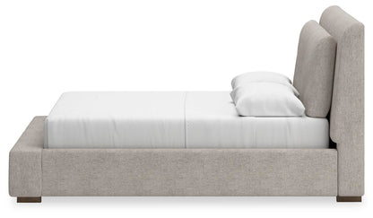 Cabalynn Queen Upholstered Bed with Mirrored Dresser