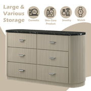 Travonte 6 - Drawer Oval Dresser with Marble Print Top