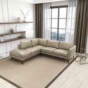 Sofá seccional Benson de cuero beige con chaise longue orientado a la izquierda