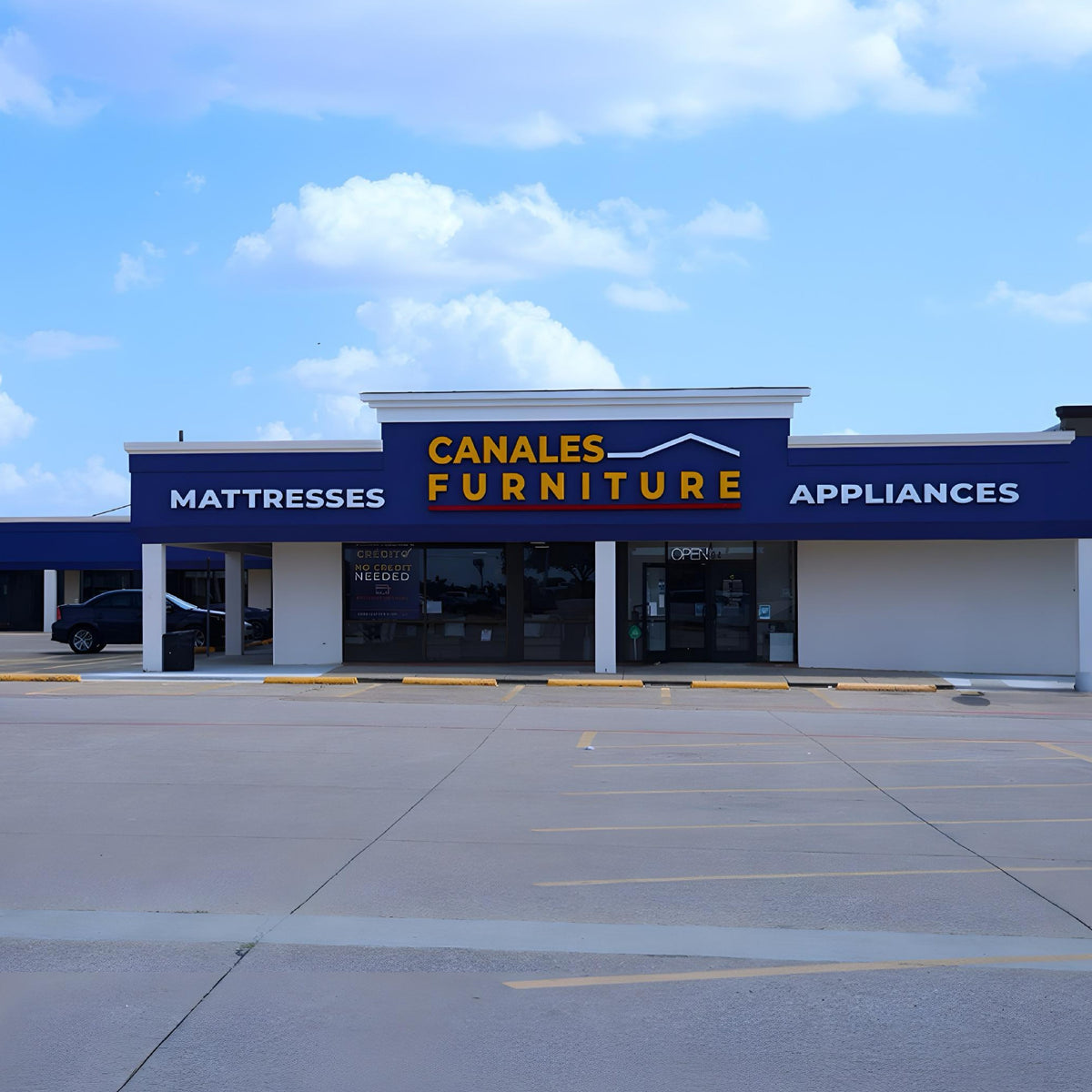 The storefront of Canales Furniture in Plano, TX.