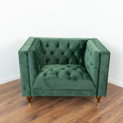Sillón Evelyn de terciopelo verde oscuro