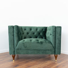 Sillón Evelyn de terciopelo verde oscuro