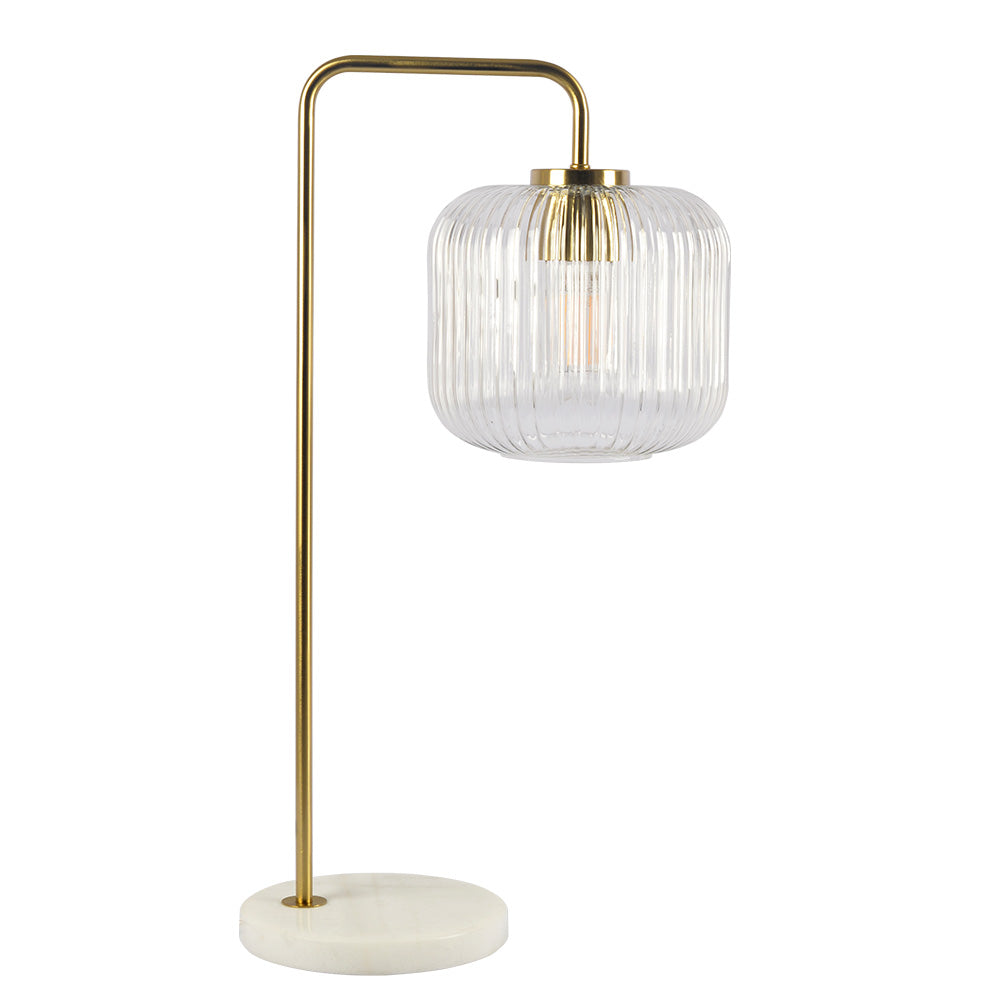 Lámpara de mesa Haven de vidrio transparente, base de mármol y metal cepillado dorado, control por botones