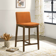 Silla de mostrador Shannon en terciopelo naranja quemado