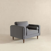 Sillón de terciopelo gris ámbar