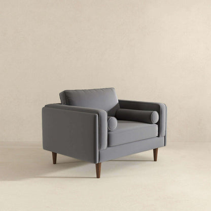 Sillón de terciopelo gris ámbar