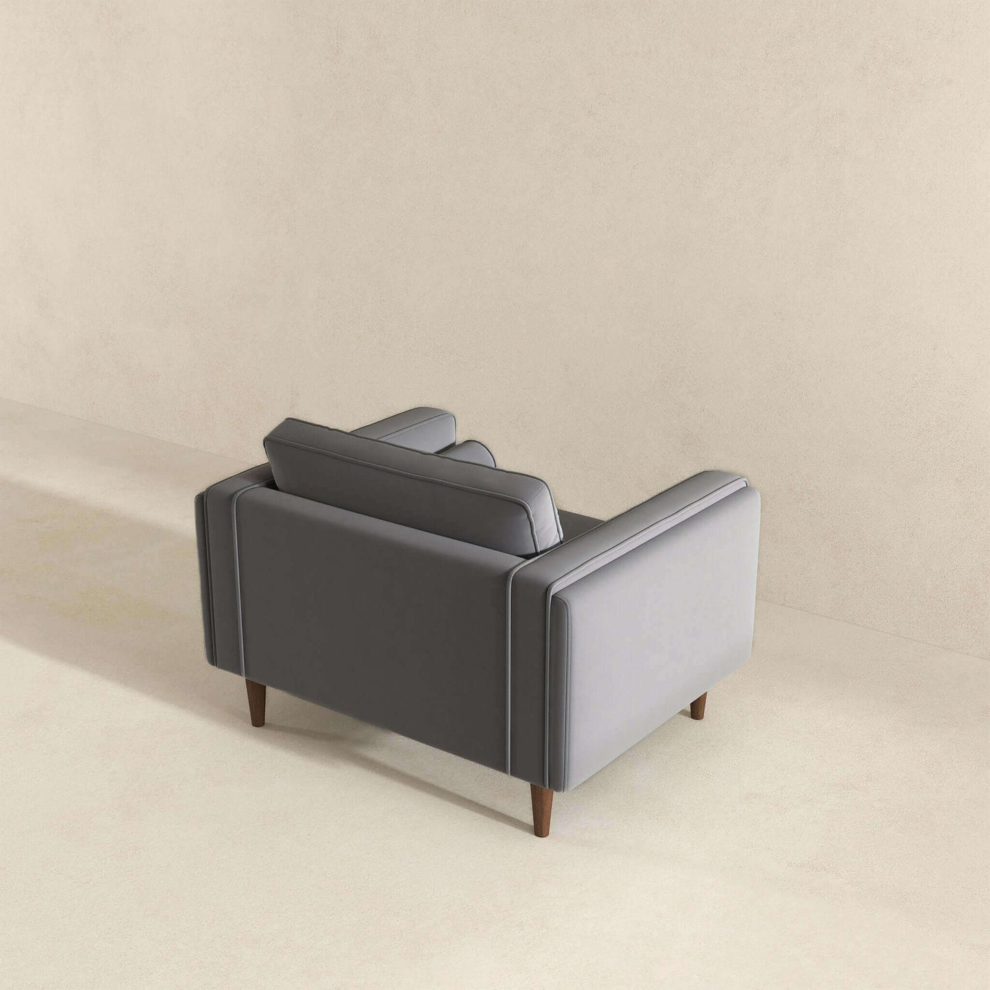 Sillón de terciopelo gris ámbar