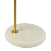 Lámpara de mesa Haven de vidrio transparente, base de mármol y metal cepillado dorado, control por botones