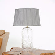 Lámpara de mesa Luxora dorada - Transparente y gris