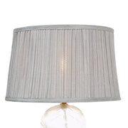 Lámpara de mesa Luxora dorada - Transparente y gris